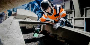 Woman working in Tornio mills, Finland.